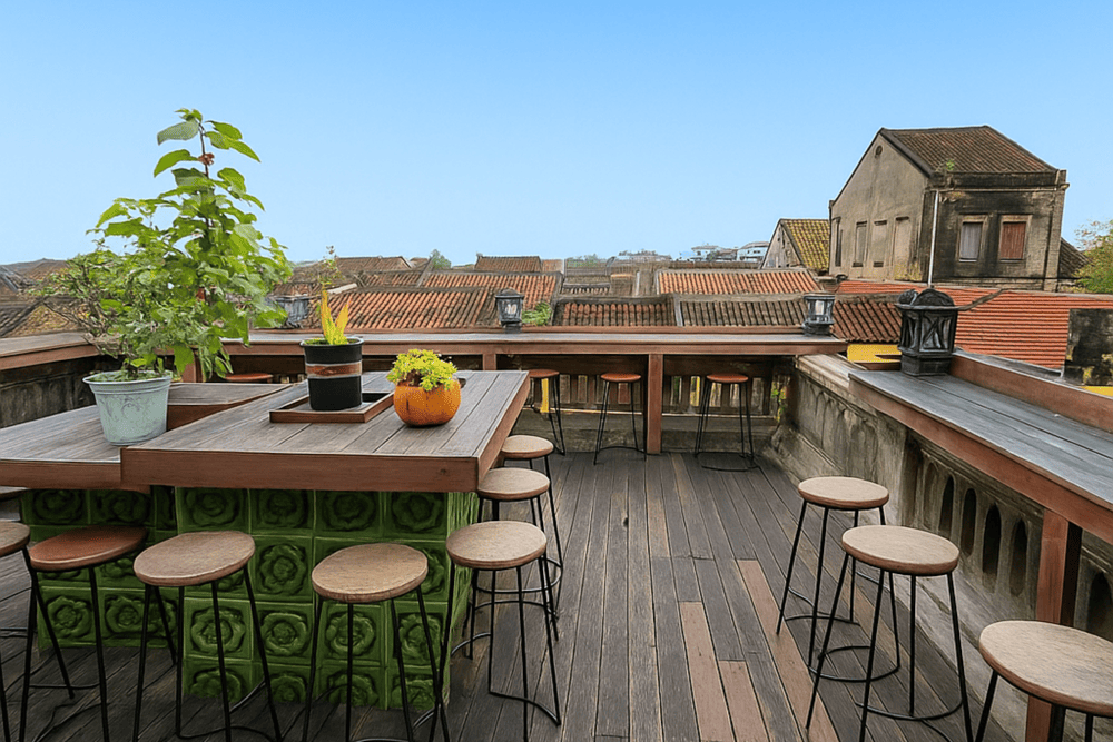 Faifo Coffee’s rooftop offers panoramic views of Hoi An’s ancient town, where guests can admire moss-covered rooftops and vibrant lanterns